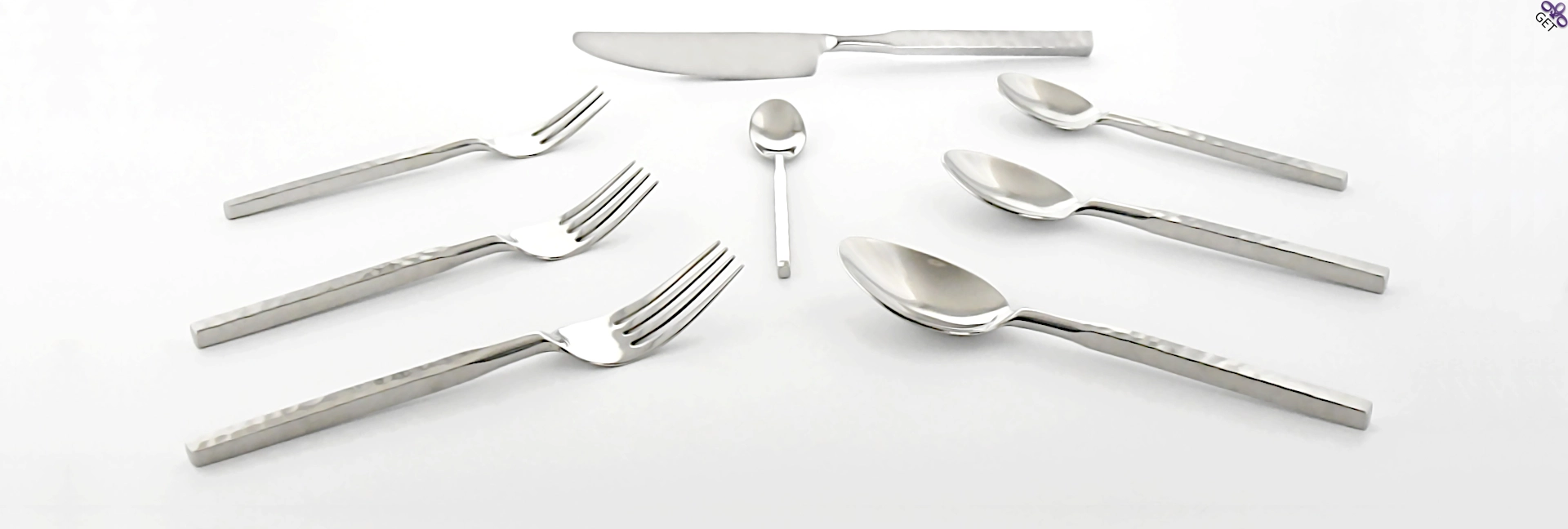 Classy Arthur flatware collection mirror polished stainless steel rectangular shaped, gently hammered handles