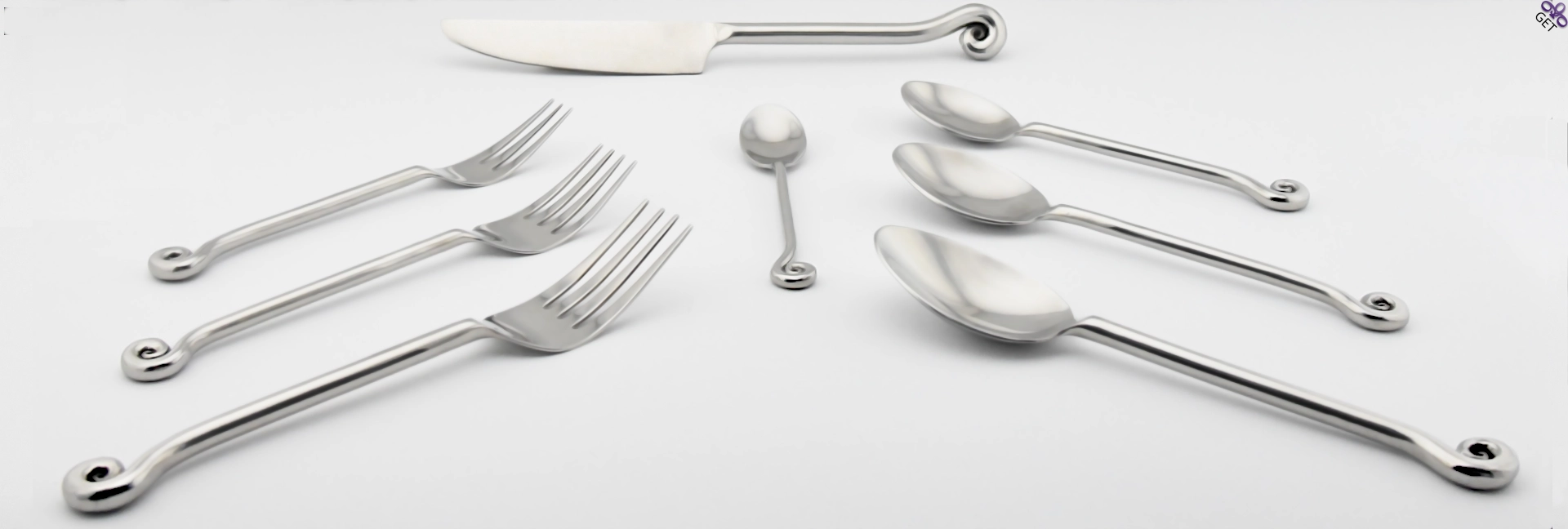 Swirl Silver flatware collection delicate, round, high polished designed handle with a swirl at the end.